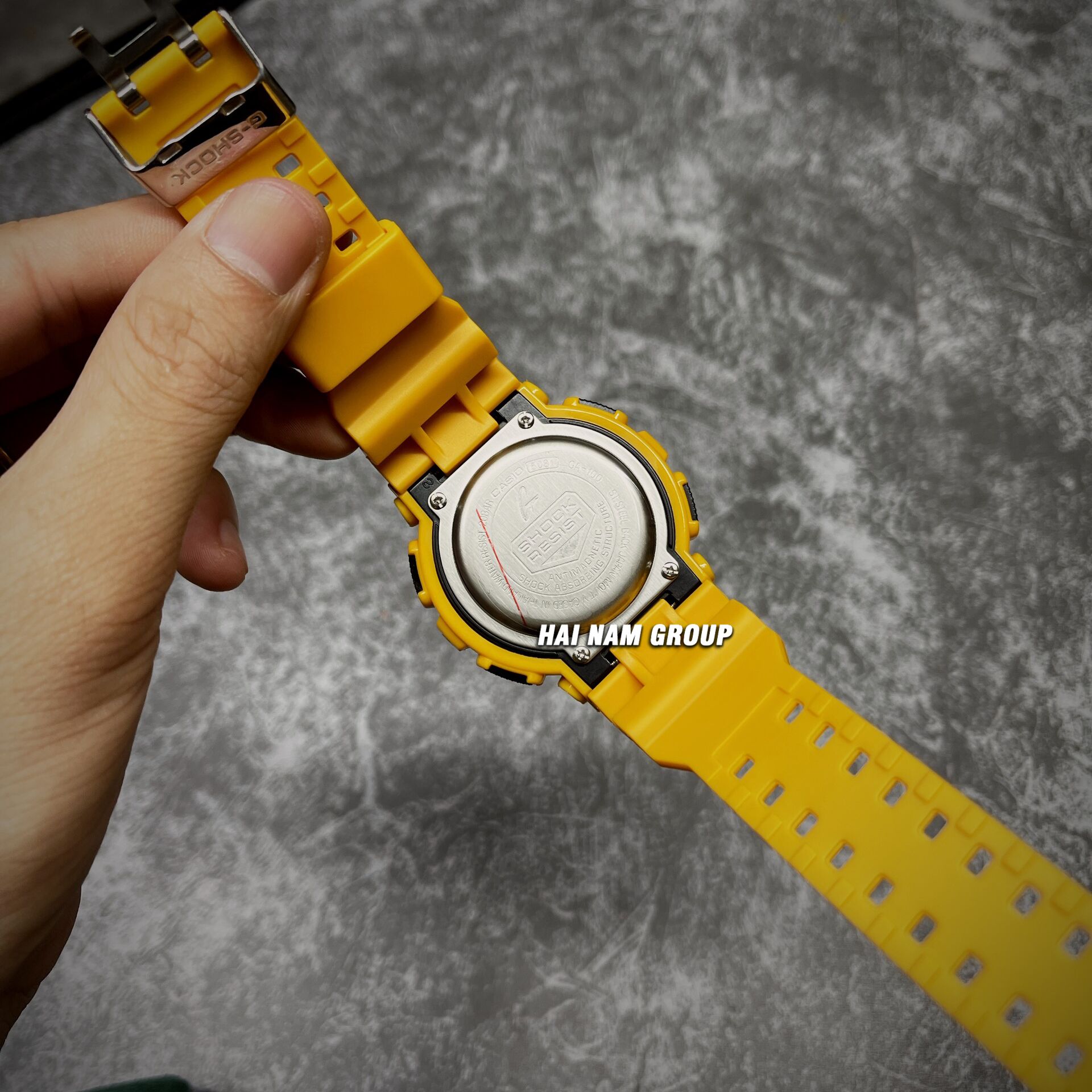 Đồng hồ nam nữ G-SHOCK GA-100A-9A REP 1:1 Vàng Mặt Đen tại Hải Nam Group 5